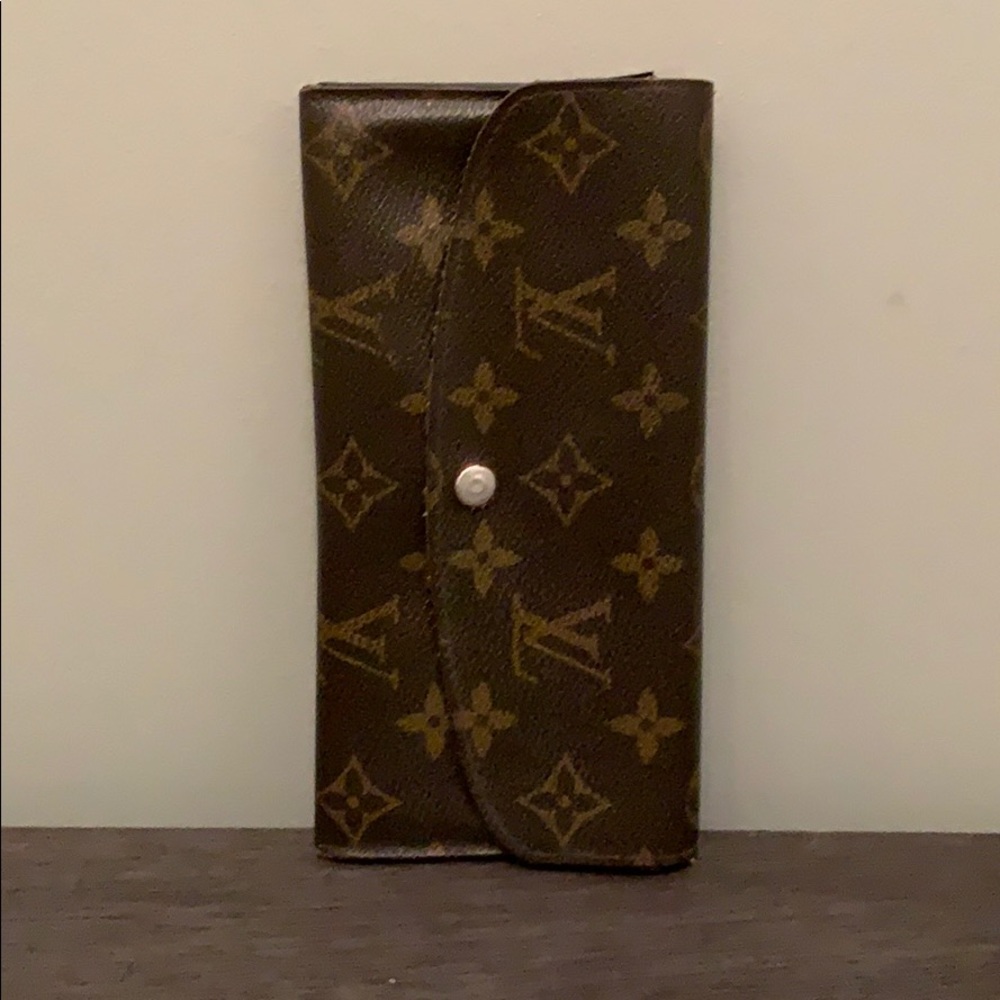 Authentic LV Emilie wallet w/ red interior